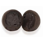 Petit tube rempli de truffes emballées